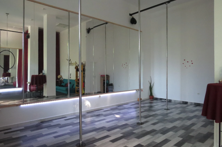 A photo of a pole dance studio